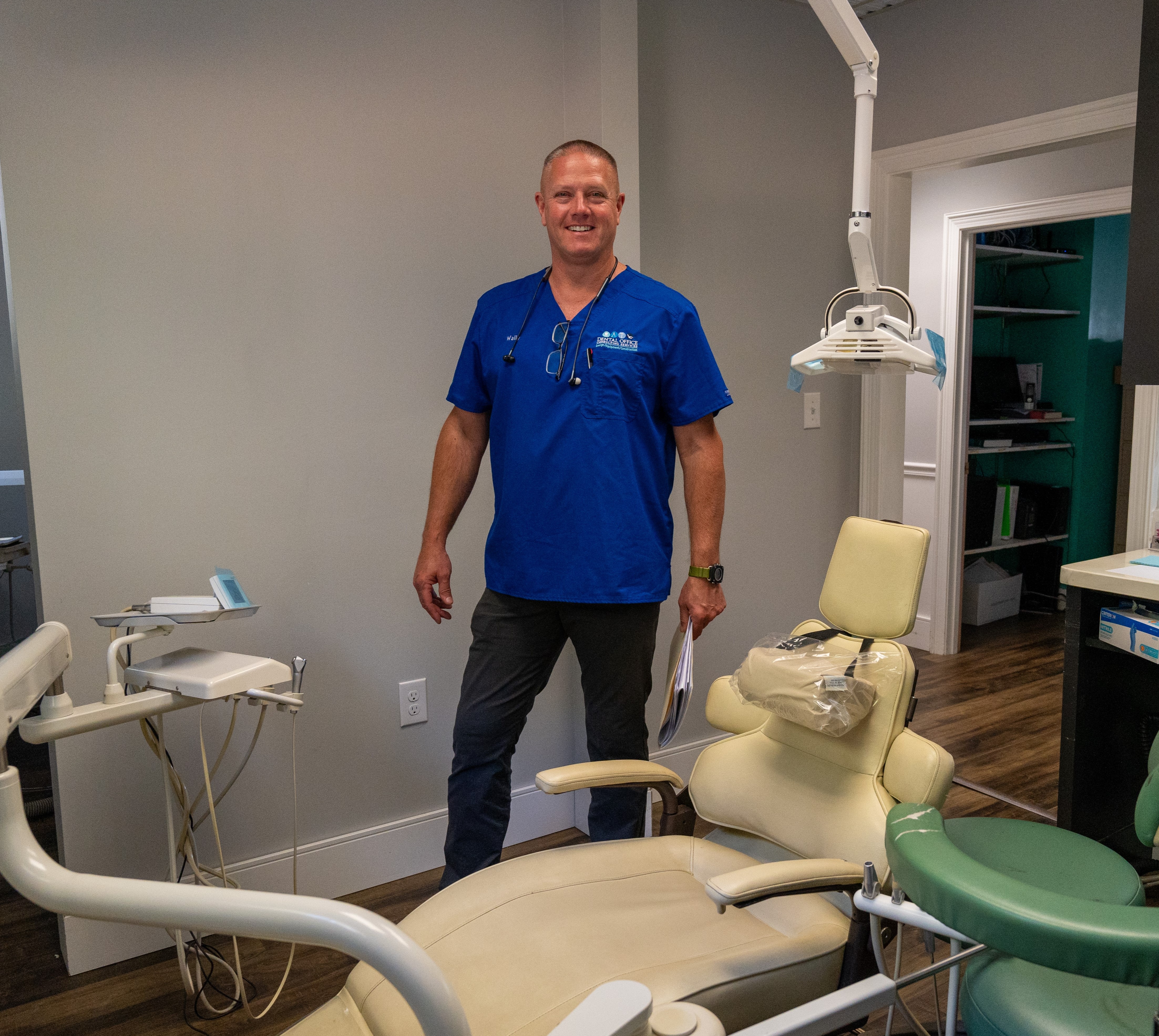 Wally standing in a dental operatory.